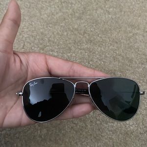 Small Raybans, can fit a child. No scratches